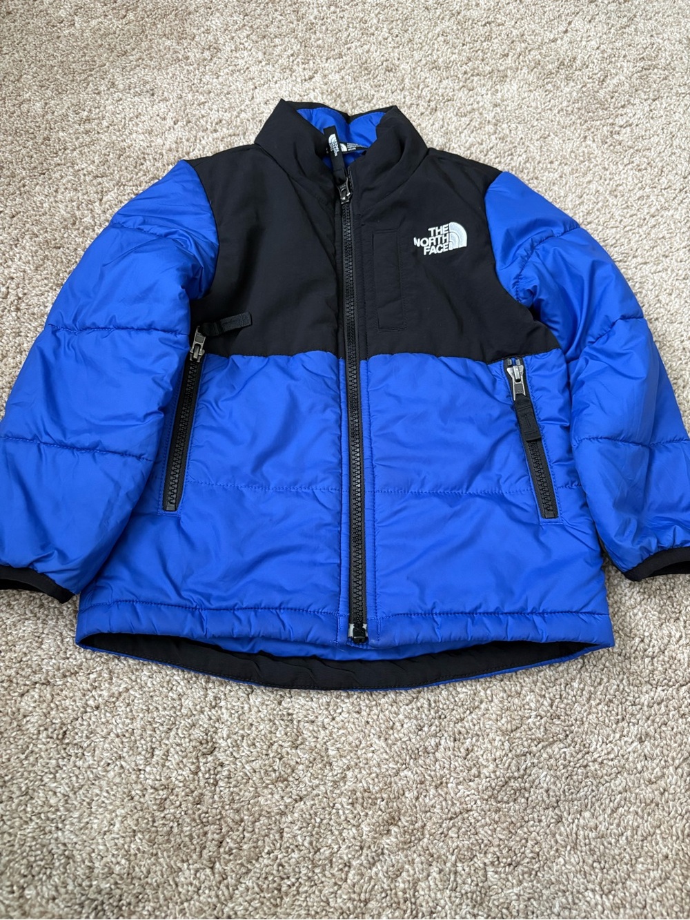 The North Face Kids Blue and Black Puffer Jacket